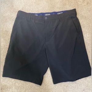 Izod golf shorts with stretch feature in pocket